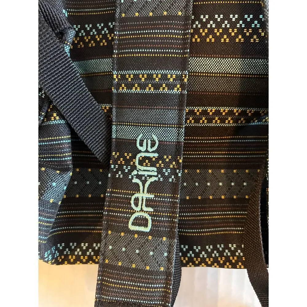 Dakine Cosmo 6.5L mini backpack black, grey, and teal geometric pattern small